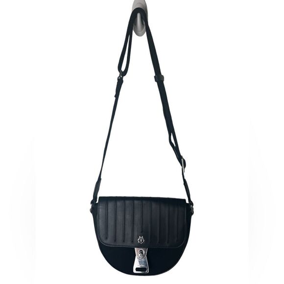 Luxurious “Never Still” Crossbody Saddlebag by Rimowa Exclusive - Picture 5 of 10